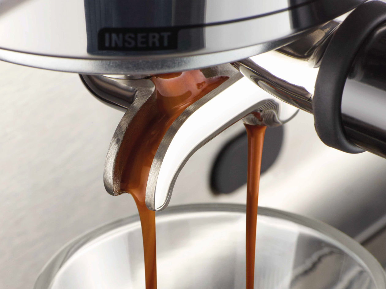 Coffee dripping into a glass