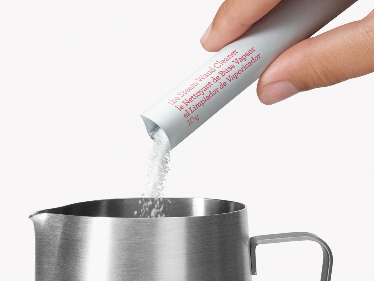 Cleaning sachets behing a espresso machine