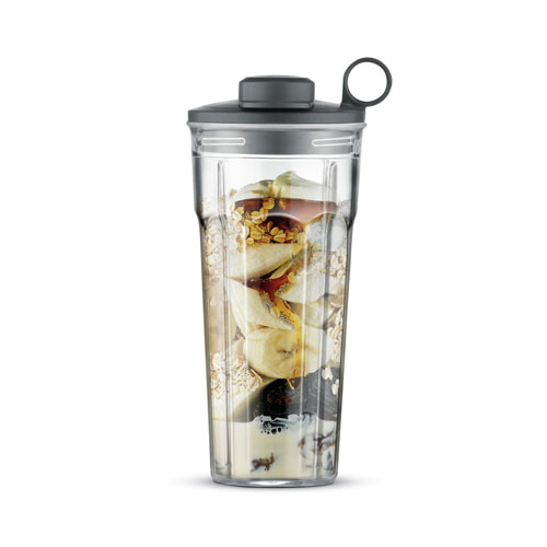Muesli fruits and yogurt in the tumbler