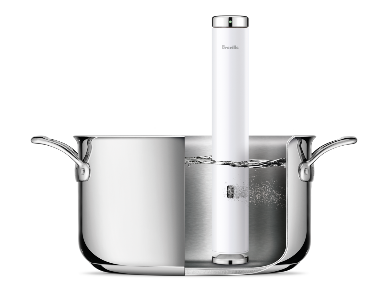 The Joule Turbo Sous Vide inside a pan filled up with water